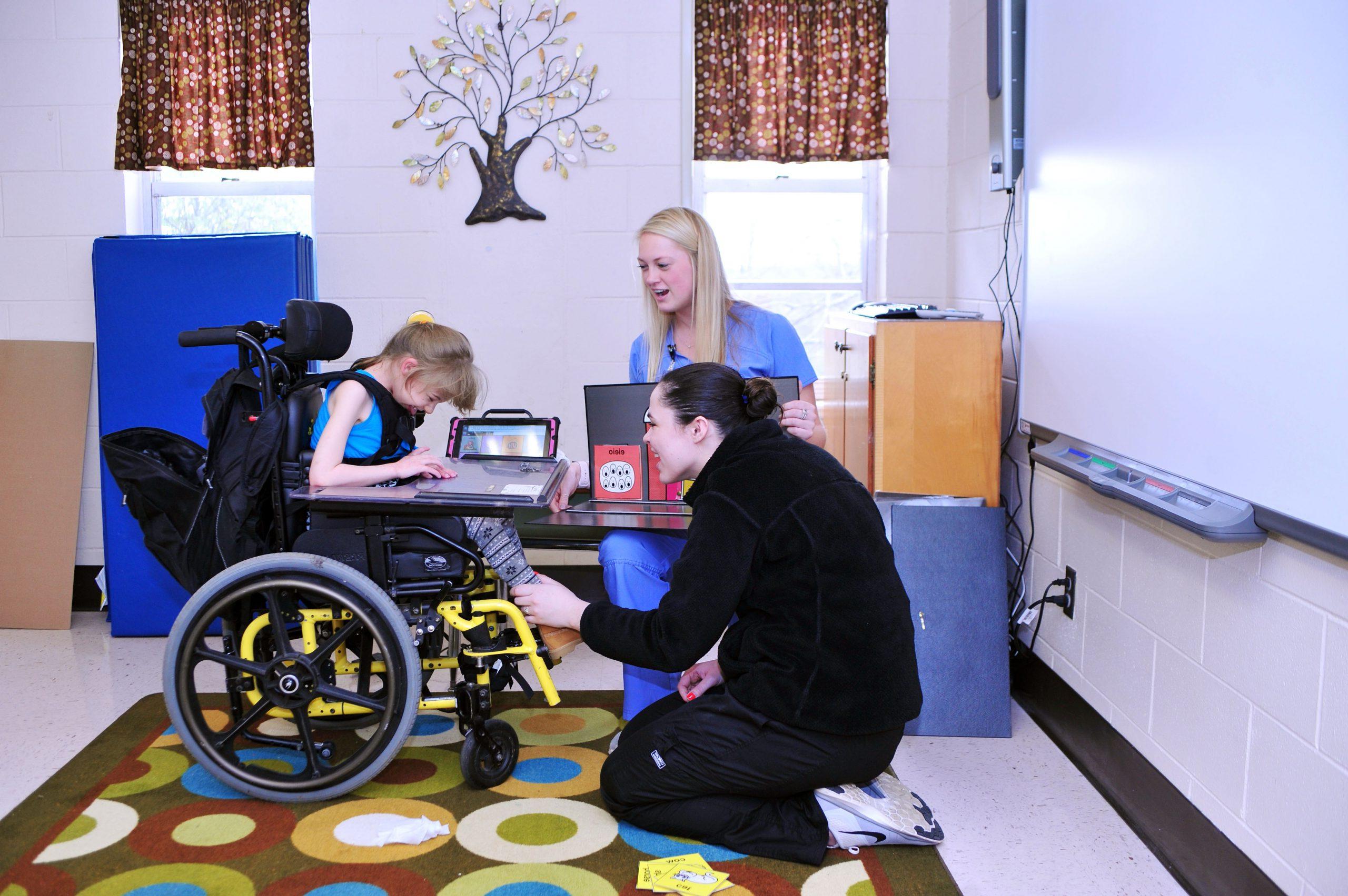 Speech pathology students providing services.